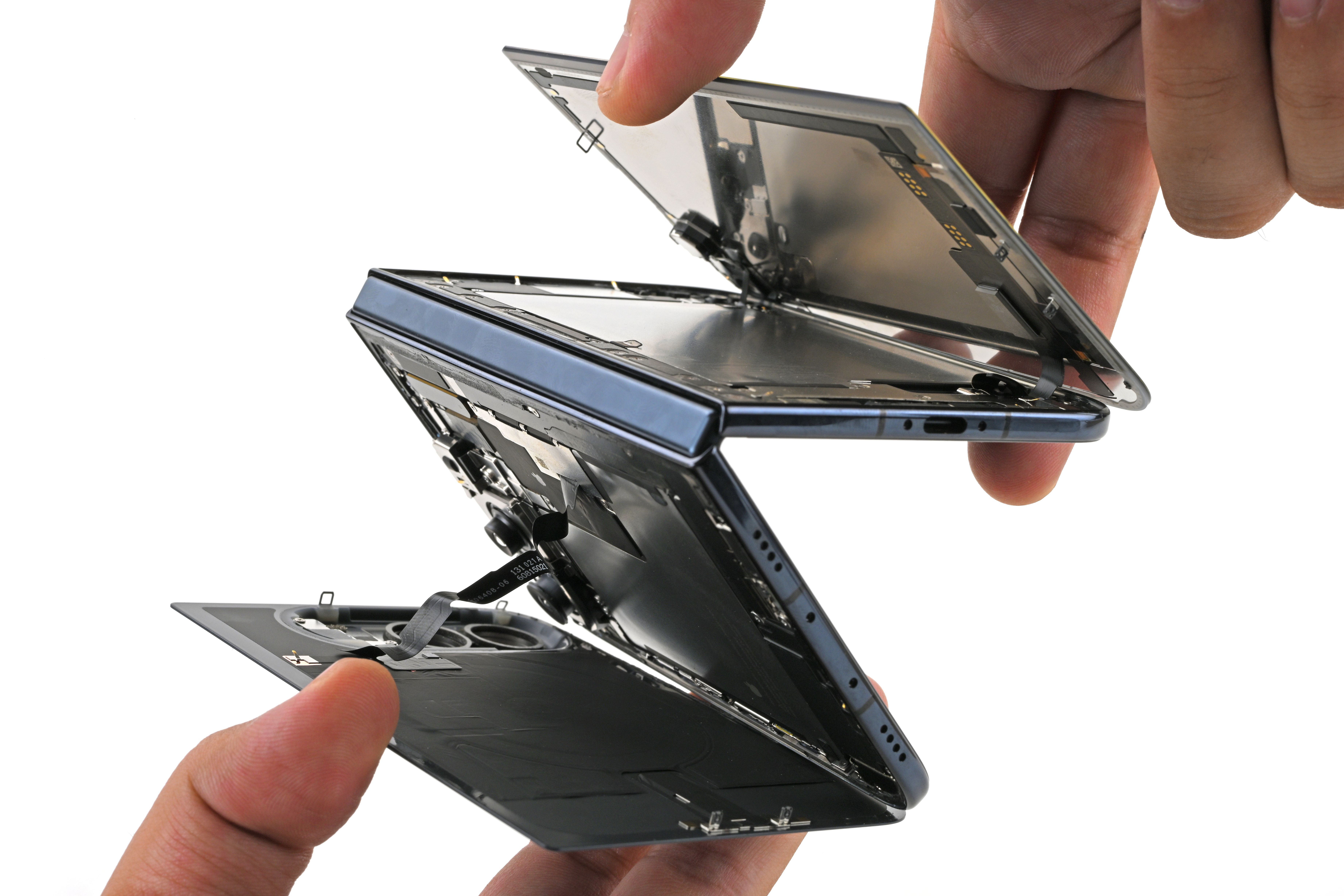 Some iPhone Duo Models Are Breaking. iFixit’s Teardown Might Explain Why — Wired, Beijing Business news